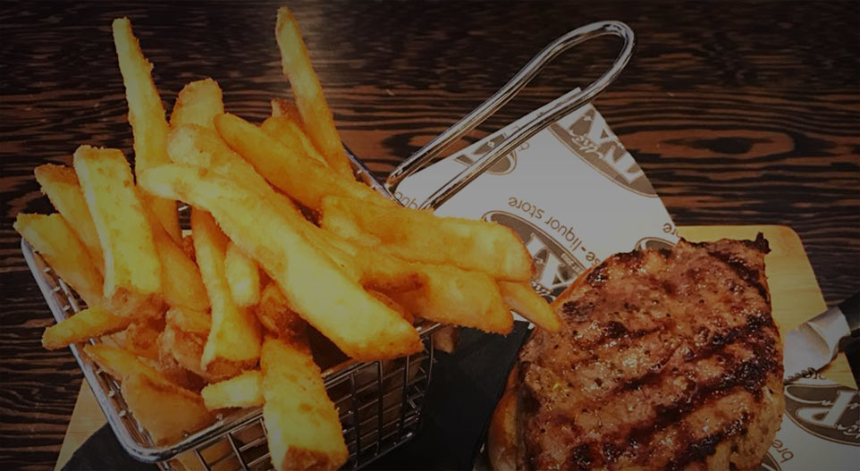 The Tap signature steak sandwich and fries